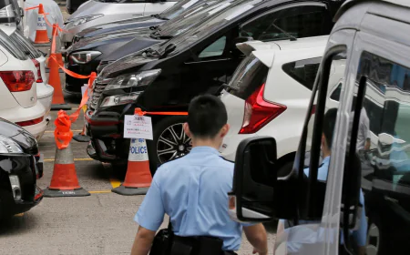Hong Kong lawmakers pass bill to regulate ride-hailing services like Uber
