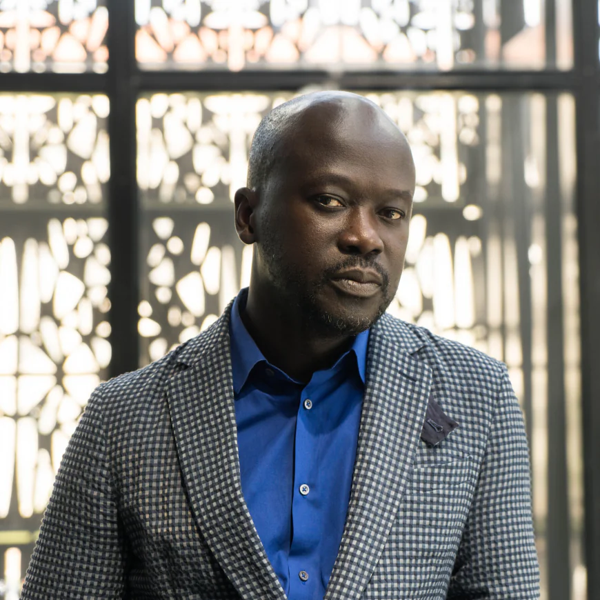 A Star Architect’s Buildings Soar. He’s Nowhere to Be Seen.