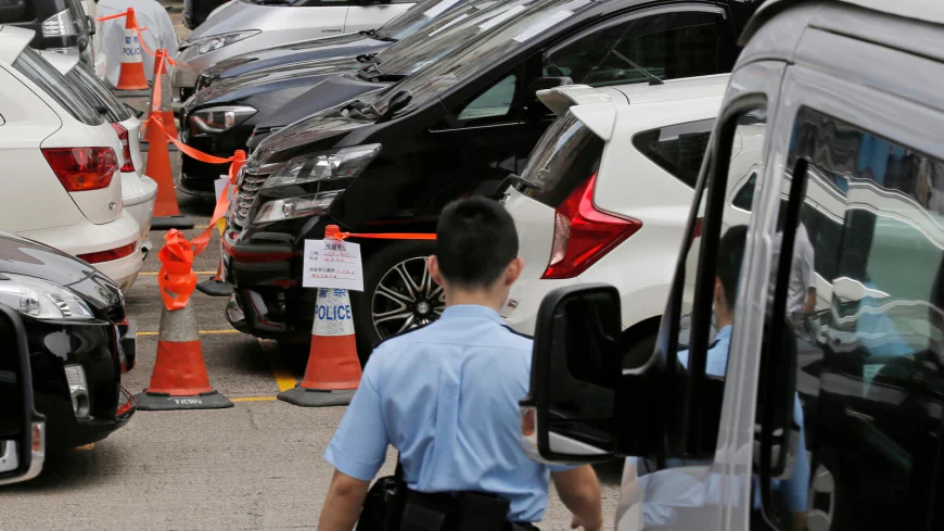 Hong Kong lawmakers pass bill to regulate ride-hailing services like Uber