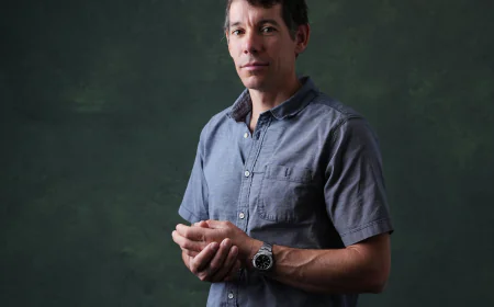 Alex Honnold is climbing Taipei 101 with no ropes, live on TV. It's drawing excitement — and concern